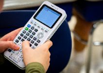  A student uses a calculator in math class.